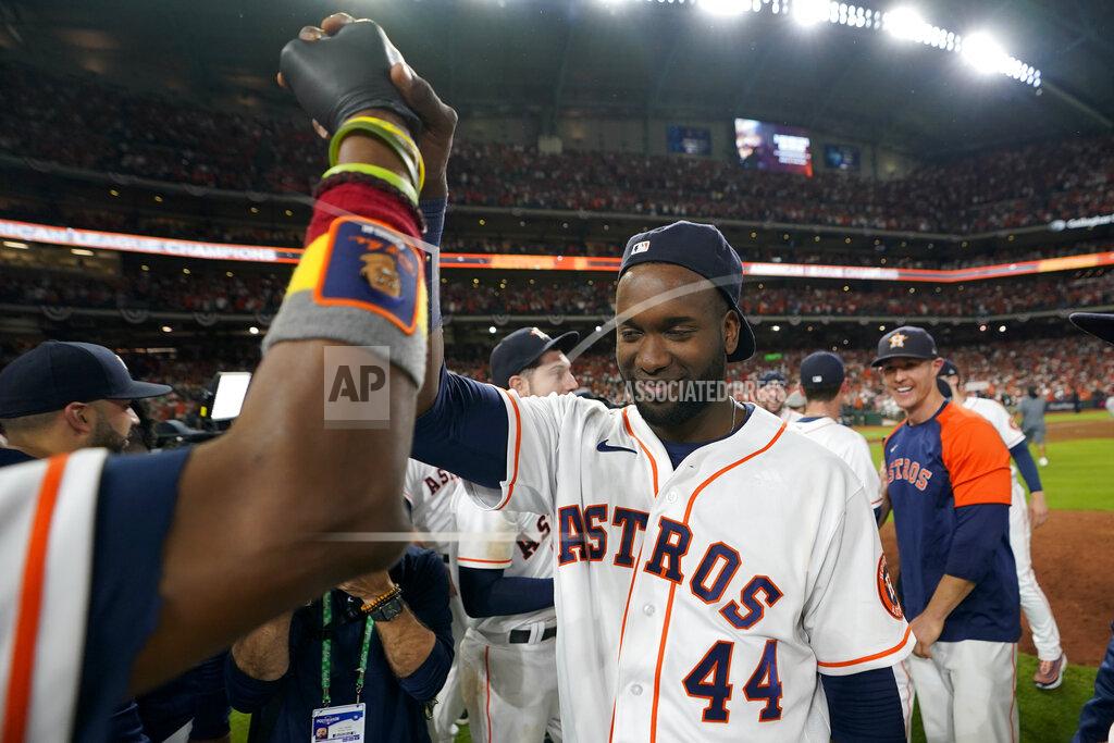 David J. Phillip Houston Astros designated hitter Yordan Alvarez celebrates after their win against the Boston Red Sox in Game 6 of baseball's American League Championship Series Friday, Oct. 22, 2021, in Houston. The Astros won 5-0, to win the ALCS series in game six. (AP Photo/David J. Phillip)