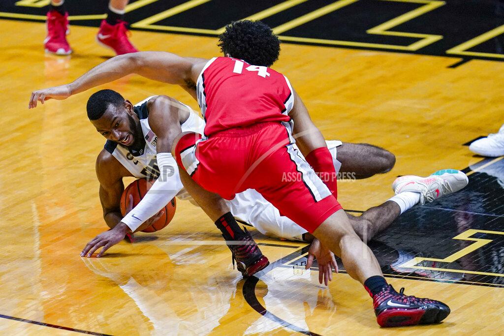 Michael Conroy Purdue forward Aaron Wheeler (1) grabs a loose ball in front of Ohio State forward Justice Sueing (14) during the second half of an NCAA college basketball game in West Lafayette, Ind., Wednesday, Dec. 16, 2020. (AP Photo/Michael Conroy)