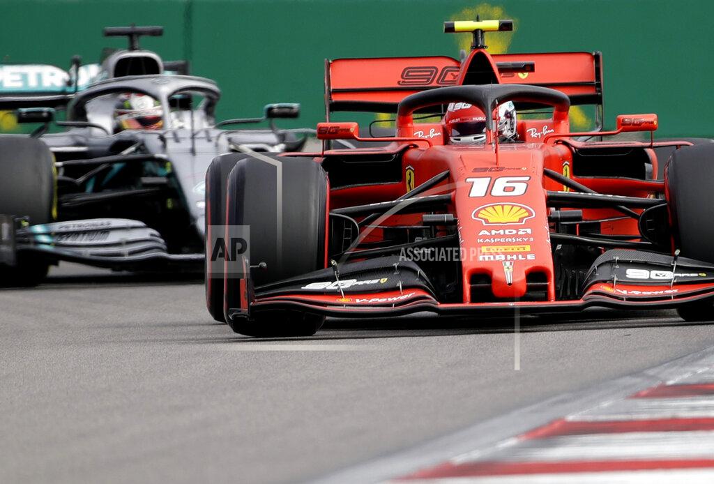 Luca Bruno Ferrari driver Charles Leclerc of Monaco steers his car followed by Mercedes driver Lewis Hamilton of Britain during the first free practice at the 'Sochi Autodrom' Formula One circuit, in Sochi, Russia, Friday, Sept. 27, 2019. The Formula one race will be held on Sunday. (AP Photo/Luca Bruno)