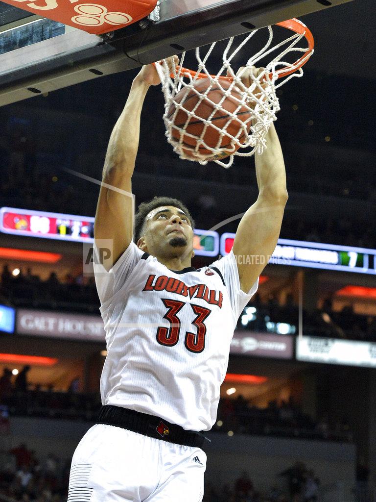 Timothy D. Easley Louisville forward Jordan Nwora (33) dunks the ball during the second half of an NCAA college basketball game against Miami in Louisville, Ky., Sunday, Jan. 6, 2019. Louisville won 90-73. (AP Photo/Timothy D. Easley)