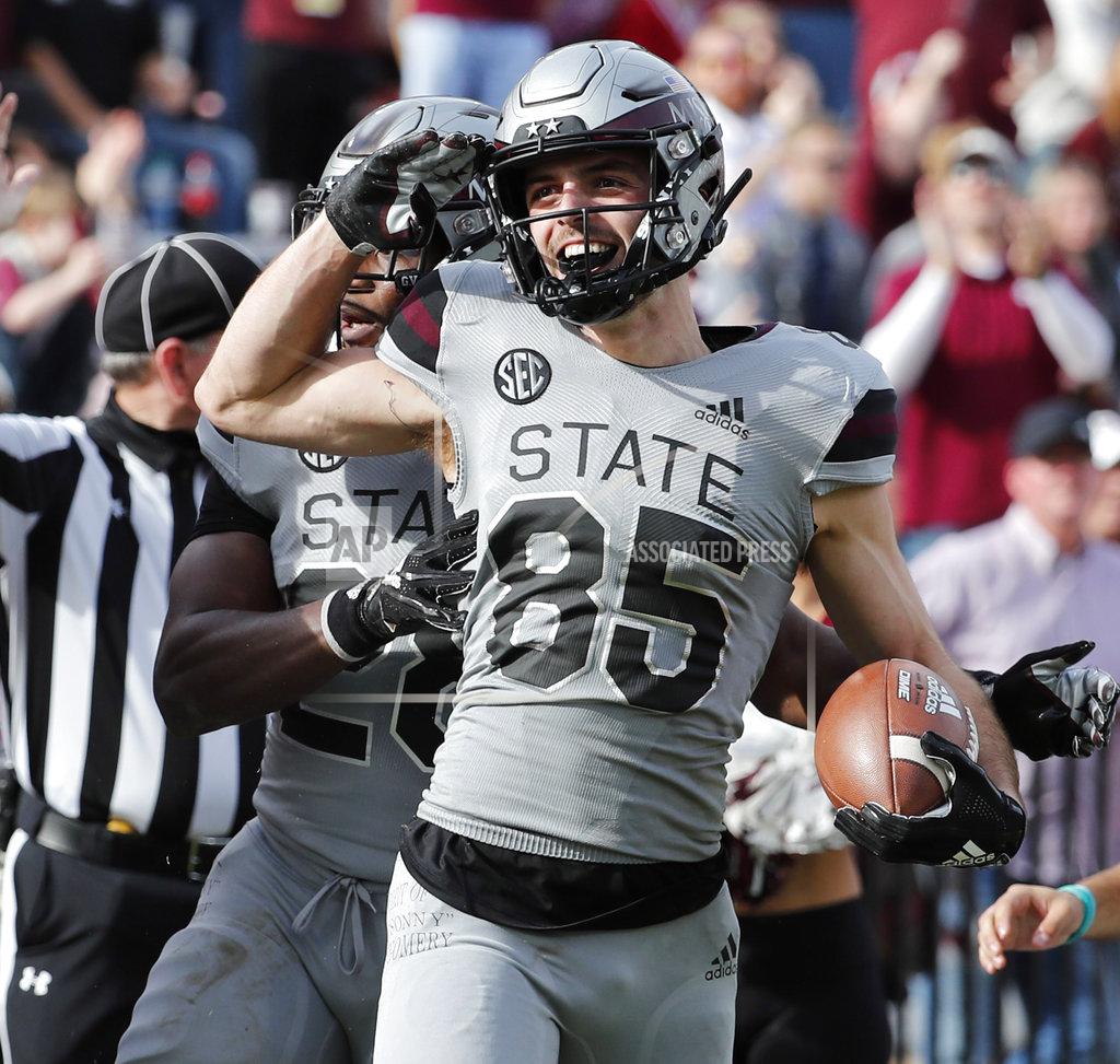 Rogelio V. Solis Mississippi State wide receiver Austin Williams (85) salutes after scoring a touchdown against Arkansas in the second half of an NCAA college football game in Starkville, Miss., Saturday, Nov. 17, 2018. Mississippi State won 52-6.(AP Photo/Rogelio V. Solis)