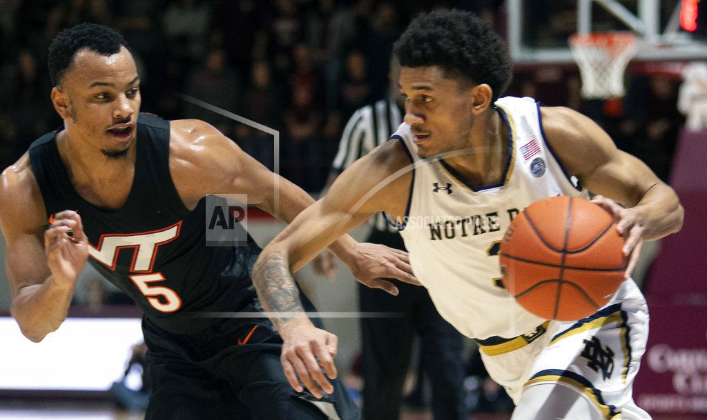 Don Petersen Notre Dame guard Prentiss Hubb (3) drives the ball against Virginia Tech guard Justin Robinson (5) during the first half of an NCAA college basketball game Tuesday, Jan. 1, 2019, in Blacksburg, Va. Va. Tech won 81-66. (AP Photo/Don Petersen)