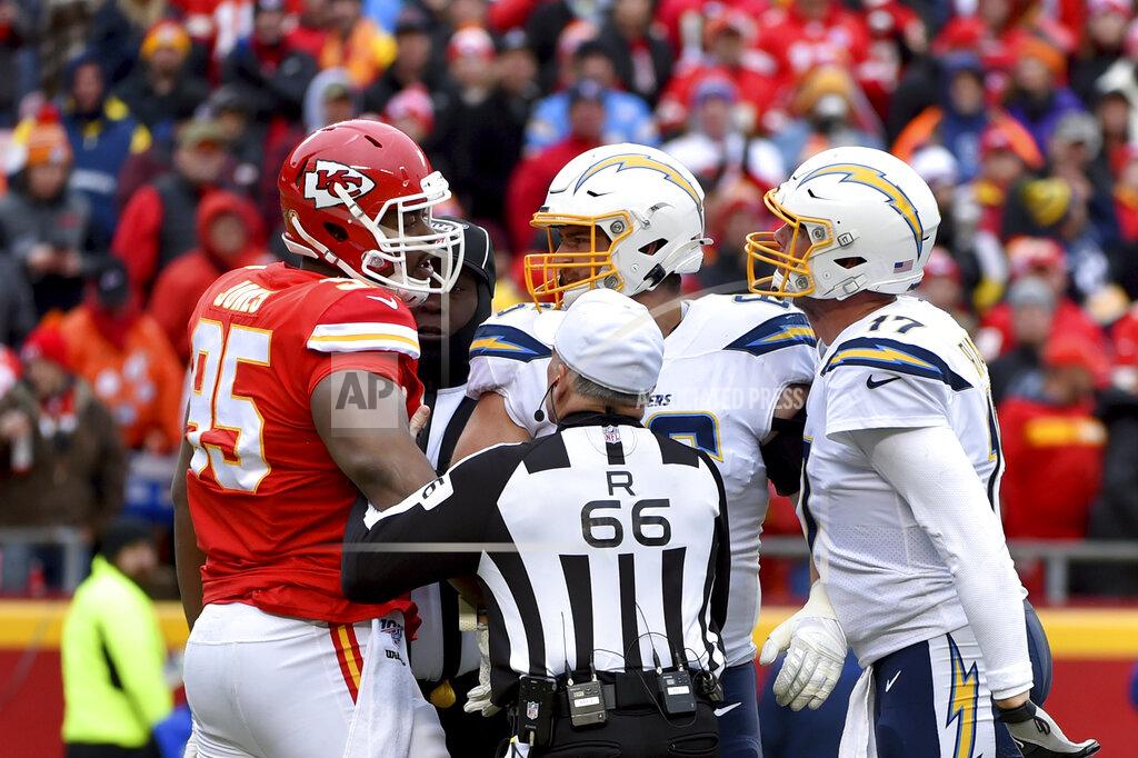 Ed Zurga Kansas City Chiefs defensive tackle Chris Jones (95) and Los Angeles Chargers quarterback Philip Rivers (17) argue during the first half of an NFL football game in Kansas City, Mo., Sunday, Dec. 29, 2019. (AP Photo/Ed Zurga)