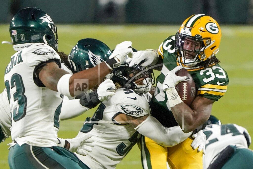 Morry Gash Green Bay Packers' Aaron Jones runs during the second half of an NFL football game against the Philadelphia Eagles Sunday, Dec. 6, 2020, in Green Bay, Wis. (AP Photo/Morry Gash)