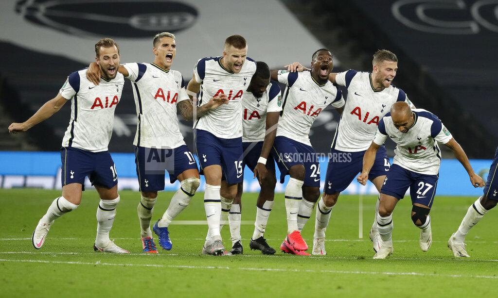 Matt Dunham Tottenham players celebrate during the English League Cup fourth round soccer match between Tottenham Hotspur and Chelsea at Tottenham Hotspur Stadium in London, England, Tuesday, Sept. 29, 2020.Tottenham defeated Chelsea 5-4 on penalties. (Matt Dunham/Pool via AP)