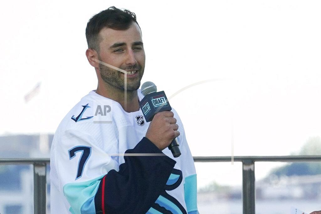 Ted S. Warren Jordan Eberle, a forward from the New York Islanders, speaks after being introduced as a new player for the Seattle Kraken, Wednesday, July 21, 2021, during the Kraken's NHL hockey expansion draft event in Seattle. (AP Photo/Ted S. Warren)