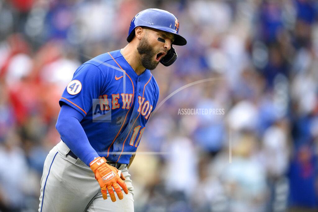 Nick Wass New York Mets' Kevin Pillar reacts after he hit a grand slam during the ninth inning of a baseball game against the Washington Nationals, Sunday, Sept. 5, 2021, in Washington. (AP Photo/Nick Wass)