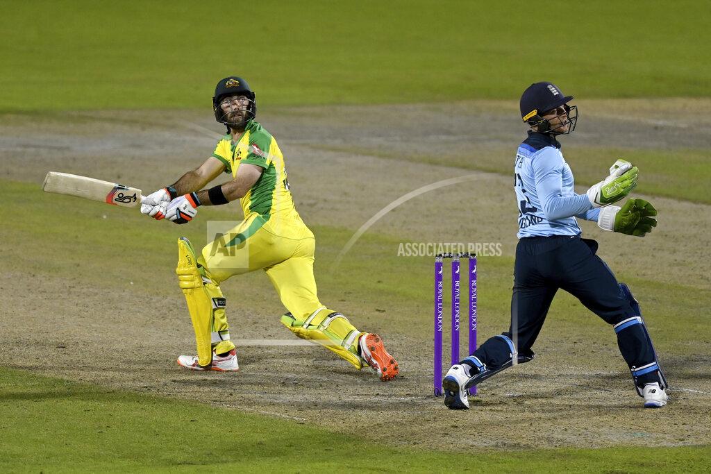 Shaun Botterill Australia's Glenn Maxwell, left, bats during the third ODI cricket match between England and Australia, at Old Trafford in Manchester, England, Wednesday, Sept. 16, 2020. (Shaun Botterill/Pool via AP)