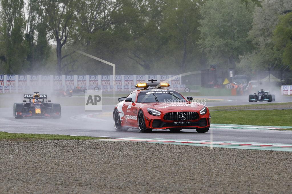 Red Bull driver Max Verstappen of the Netherlands follows the safety car during the Emilia Romagna Formula One Grand Prix, at the Imola racetrack, Italy, Sunday, April 18, 2021. (AP Photo/Luca Bruno)