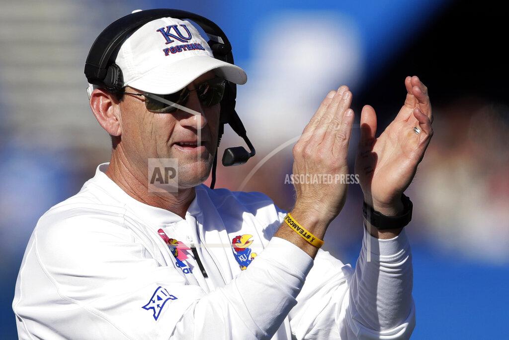 Orlin Wagner FILE - In this Oct. 27, 2018, file photo, Kansas head coach David Beaty applauds his team during the first half of an NCAA college football game against TCU in Lawrence, Kan. Former Kansas football coach David Beaty is no longer part of an NCAA infractions case against the school, according to the independent agency investigating the case. Beaty says he plans to get back to coaching now that the NCAA allegations are behind him. (AP Photo/Orlin Wagner, File)