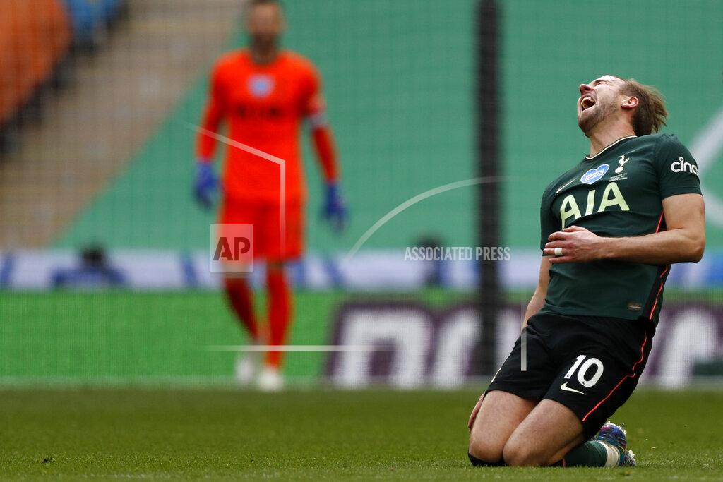 Alastair Grant Tottenham's Harry Kane reacts after a tackle from Manchester City's Ruben Dias during the English League Cup final soccer match between Manchester City and Tottenham Hotspur at Wembley stadium in London, Sunday, April 25, 2021. (AP Photo/Alastair Grant)