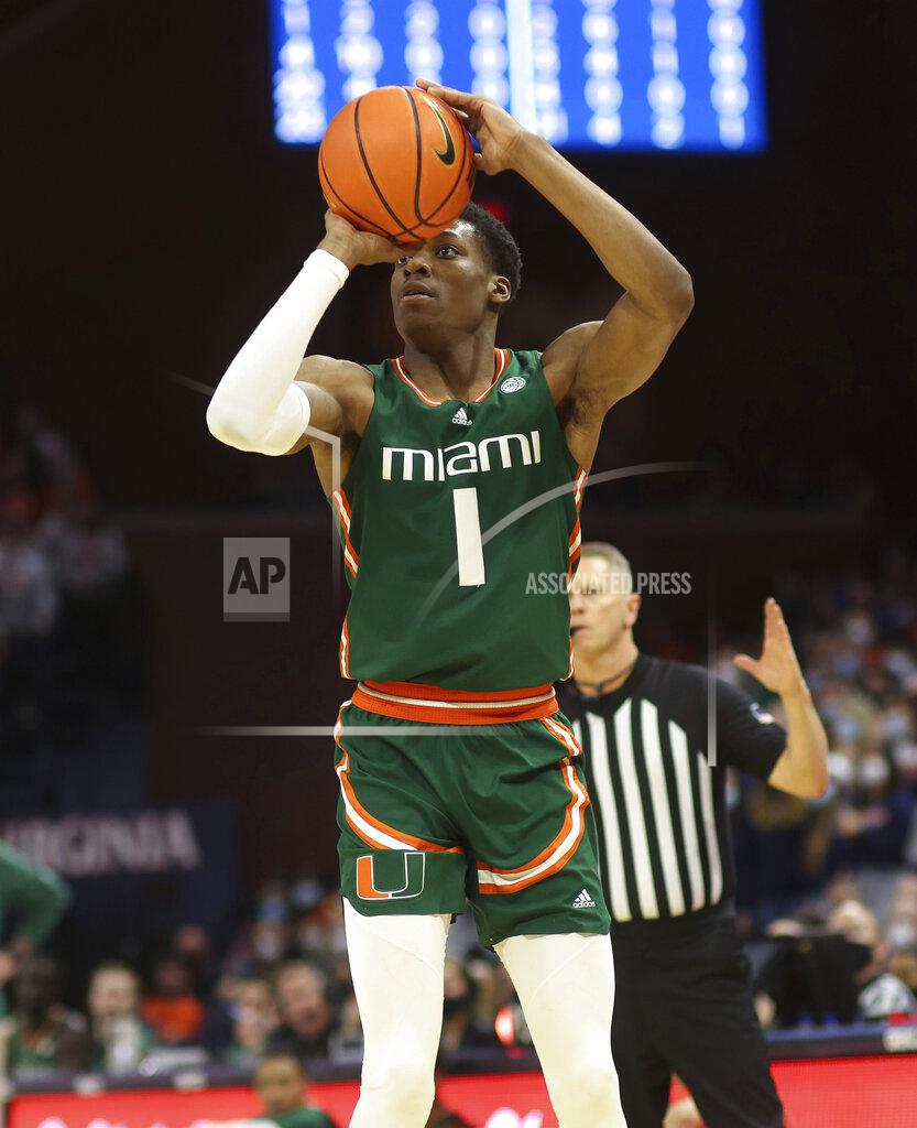 Andrew Shurtleff Miami forward Anthony Walker (1) shoots the ball during an NCAA college basketball game against Virginia in Charlottesville, Va., Saturday, Feb. 5, 2022. (AP Photo/Andrew Shurtleff)