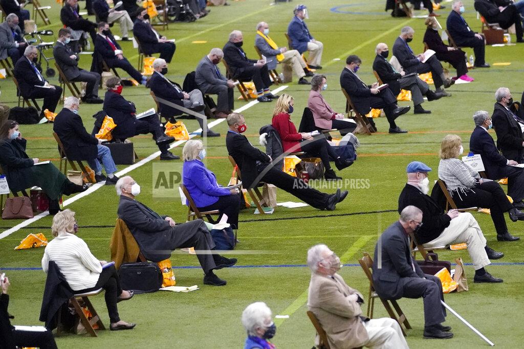Charles Krupa Legislators listen to speakers during a New Hampshire House of Representatives legislative session held at NH Sportsplex, due to the coronavirus, Wednesday, Feb. 24, 2021, in Bedford, N.H. (AP Photo/Charles Krupa)