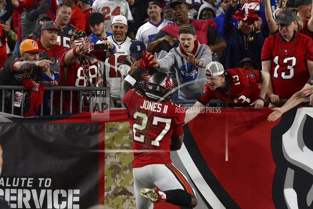 Jason Behnken Tampa Bay Buccaneers running back Ronald Jones II celebrates his touchdown run against the New York Giants with the fans during the first half of an NFL football game Monday, Nov. 22, 2021, in Tampa, Fla. (AP Photo/Jason Behnken)