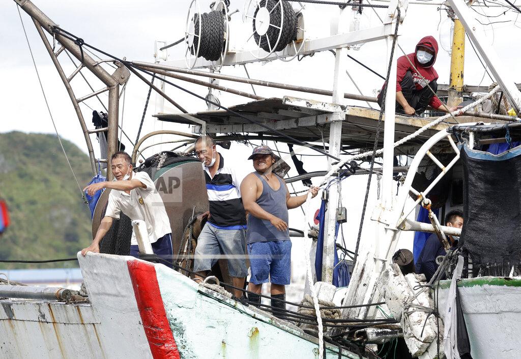 Chiang Ying-Ying Fishermen fasten a boat to take shelter as Typhoon Chanthu approaches to Taiwan in Keelung, New Taipei City, Taiwan, Saturday, Sept. 11, 2021. Taiwan’s weather bureau warned of high winds and heavy rain as Typhoon Chanthu roared toward the island Saturday and said the storm’s center was likely to pass its east coast instead of hitting land. (AP Photo/Chiang Ying-ying)