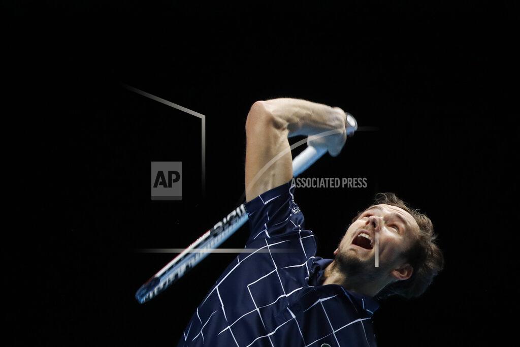 Frank Augstein Daniil Medvedev of Russia serves the ball to Rafael Nadal of Spain during their semifinal match at the ATP World Finals tennis tournament at the O2 arena in London, Saturday, Nov. 21, 2020. (AP Photo/Frank Augstein)