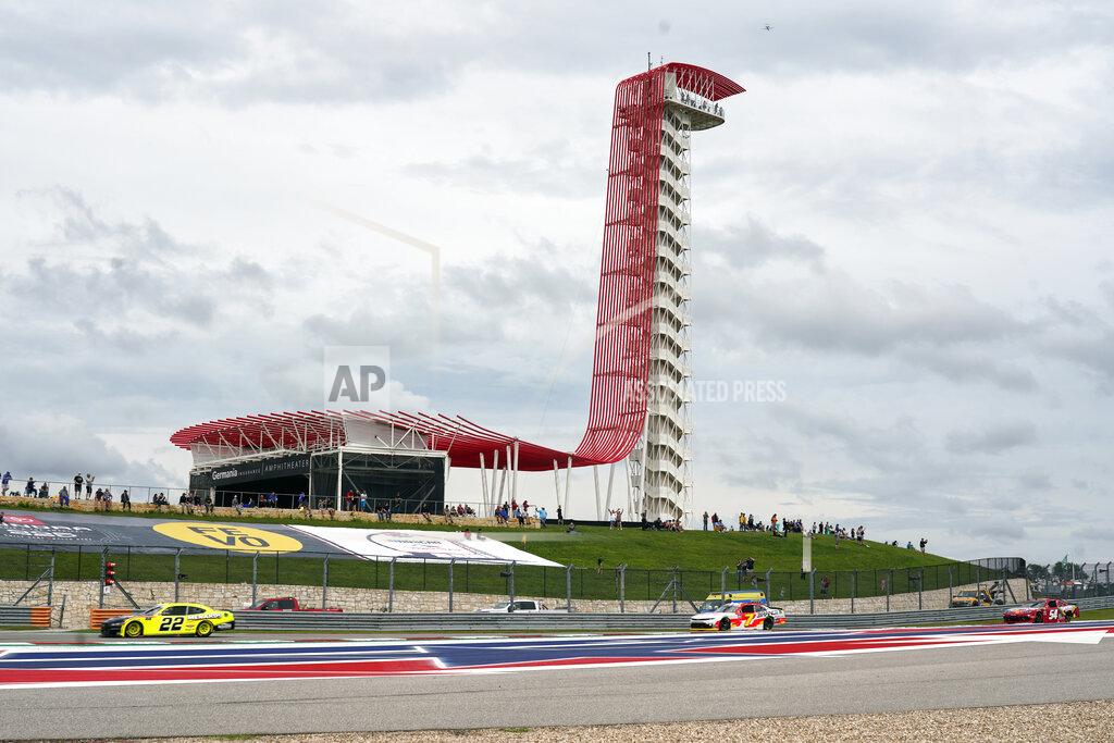 Chuck Burton Austin Cindric (22) leads Justin Allgaier (7) and Kyle Busch (54) out of Turn 18 during the NASCAR Xfinity Series auto race at the Circuit of the Americas in Austin, Texas, Saturday, May 22, 2021. (AP Photo/Chuck Burton)
