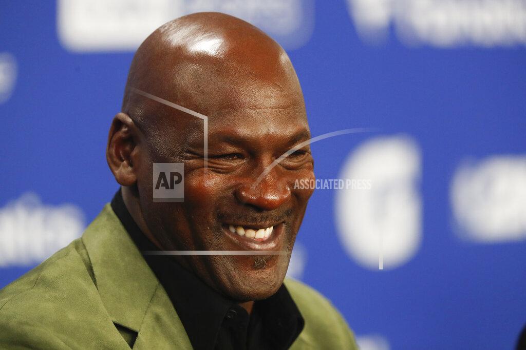 Former basketball superstar Michael Jordan speaks during a press conference ahead of NBA basketball game between Charlotte Hornets and Milwaukee Bucks in Paris, Friday, Jan. 24, 2020. (AP Photo/Thibault Camus))