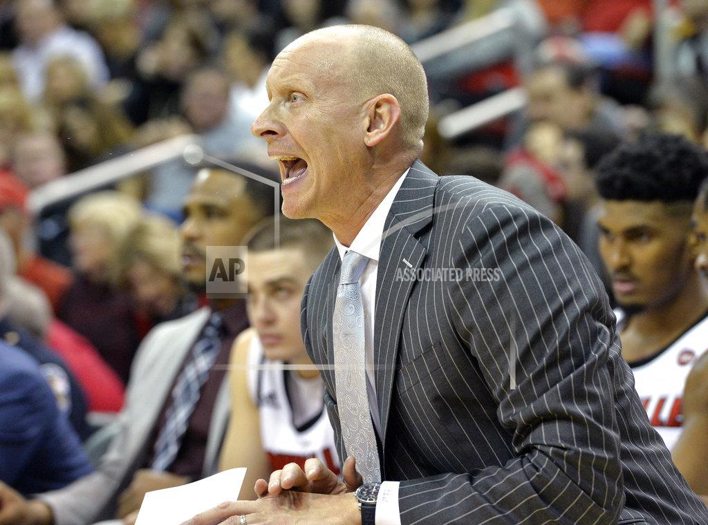 Timothy D. Easley Louisville head coach Chris Mack shouts instructions to his team during the first half of an NCAA college basketball game against Miami in Louisville, Ky., Sunday, Jan. 6, 2019. (AP Photo/Timothy D. Easley)
