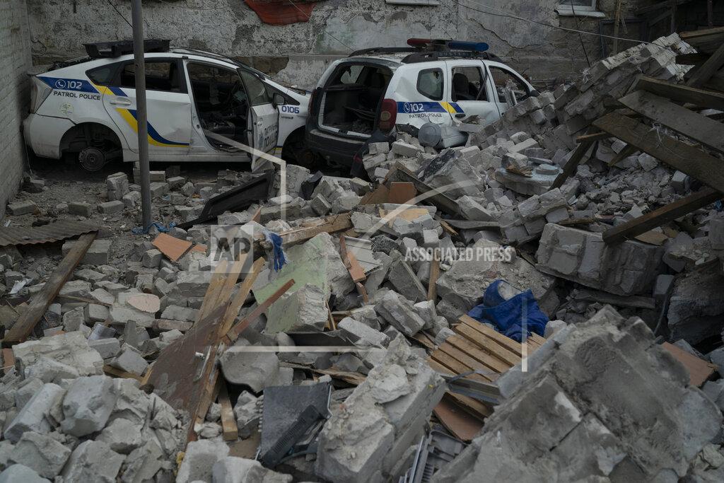 Leo Correa Police cars are seen amid debris at a police patrol department building that was heavily damaged after an airstrike by Russian forces in Lysychansk, Luhansk region, Ukraine, Friday, May 13, 2022. (AP Photo/Leo Correa)