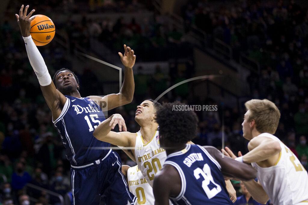 Robert Franklin Duke's Mark Williams (15) grabs a rebound over Notre Dame's Paul Atkinson Jr. (20) during the first half of an NCAA college basketball game Monday, Jan. 31, 2022, in South Bend, Ind. (AP Photo/Robert Franklin)