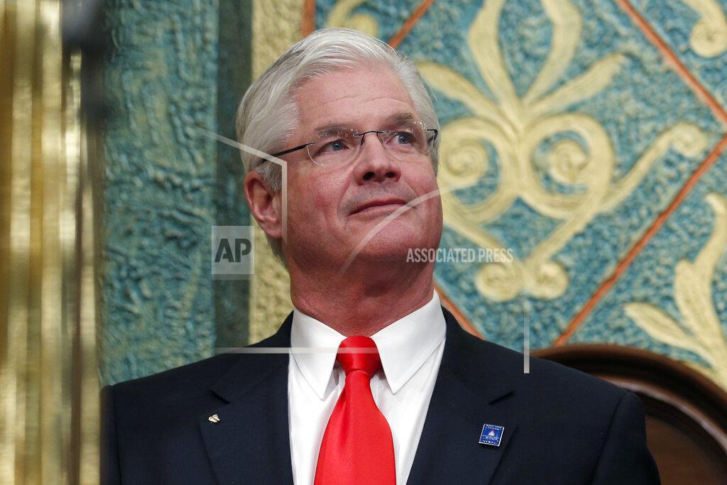 Al Goldis FILE - In this Feb. 12, 2019 file photo, state Senate Majority Leader Mike Shirkey, R-Clarklake, watches during the State of the State address at the state Capitol in Lansing, Mich. Michigan lawmakers plan to convene for the first time in weeks to lengthen Gov. Gretchen Whitmer's emergency declaration amid the coronavirus pandemic but are at odds over the extension and whether the session is even necessary. The Republican-led Legislature is scheduled to meet Tuesday, April 7, 2020, three weeks after last voting. Shirkey's spokeswoman said “He thinks we can come to some middle ground in terms of the extension, and that doesn't preclude it from being extended again if were necessary at some point.” (AP Photo/Al Goldis, File)
