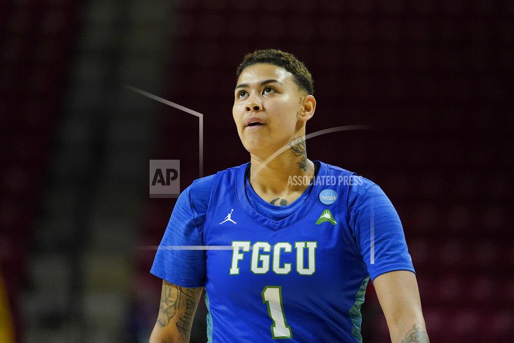 Julio Cortez Florida Gulf Coast guard Kierstan Bell looks on during the first half of a college basketball game against Maryland in the second round of the NCAA tournament, Sunday, March 20, 2022, in College Park, Md. (AP Photo/Julio Cortez)