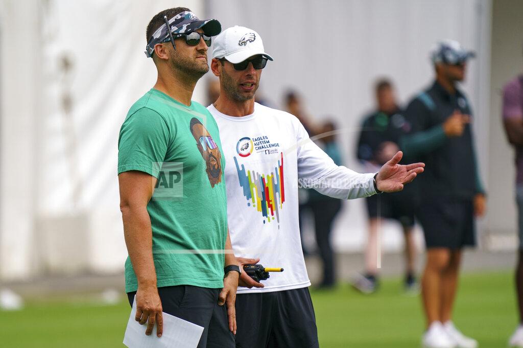 Chris Szagola Philadelphia Eagles head coach Nick Sirianni, left, listens to defensive coordinator Jonathan Gannon, right, during the NFL football team's training camp, Wednesday, July 27, 2022, in Philadelphia. (AP Photo/Chris Szagola)