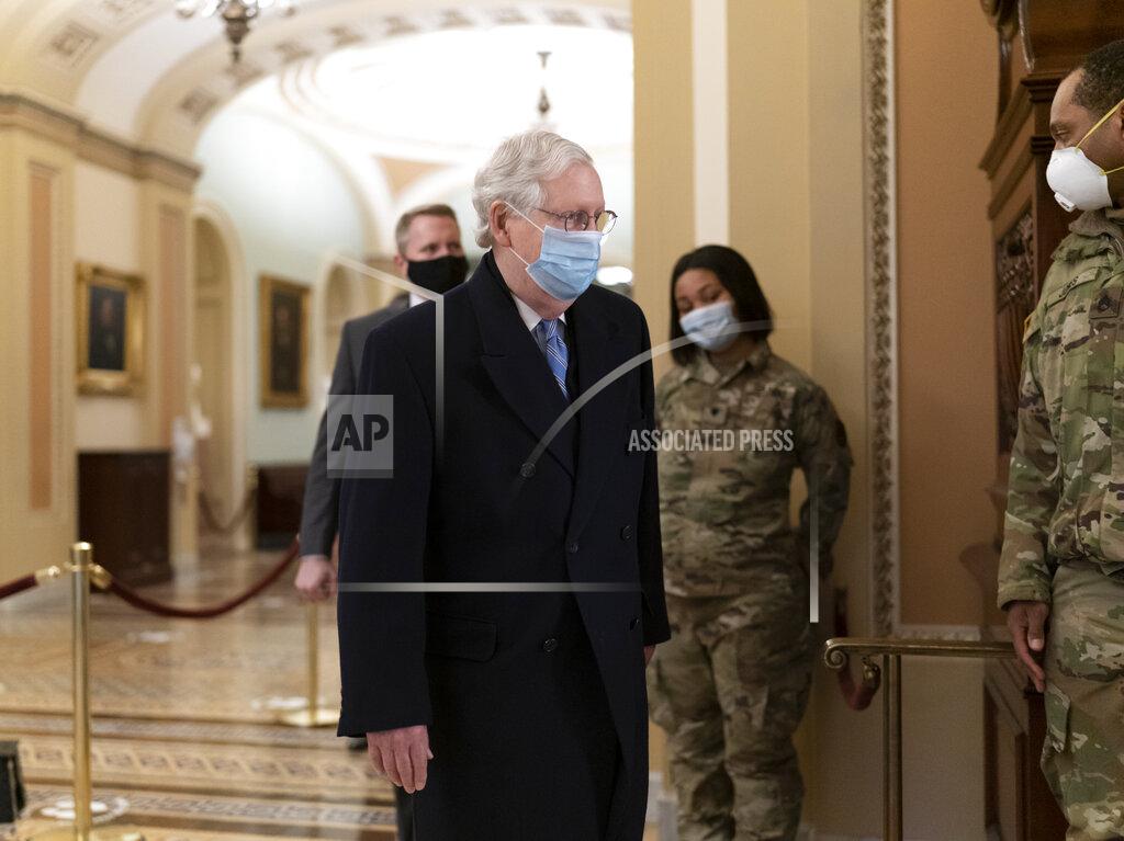 J. Scott Applewhite Senate Minority Leader Mitch McConnell, R-Ky., arrives for work as the second impeachment trial of former President Donald Trump begins in the Senate, at the Capitol in Washington, Tuesday, Feb. 9, 2021. (AP Photo/J. Scott Applewhite)