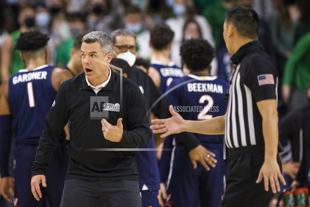 Robert Franklin Virginia head coach Tony Bennett questions a call with officials during the second half of an NCAA college basketball game against Notre Dame on Saturday, Jan. 29, 2022, in South Bend, Ind. (AP Photo/Robert Franklin)