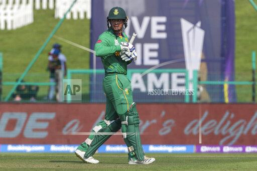 South Africa's Quinton de Kock walks from the field after he was dismissed during the Cricket Twenty20 World Cup match between South Africa and Australia in Abu Dhabi, UAE, Saturday, Oct. 23, 2021. (AP Photo/Kamran Jebreili )