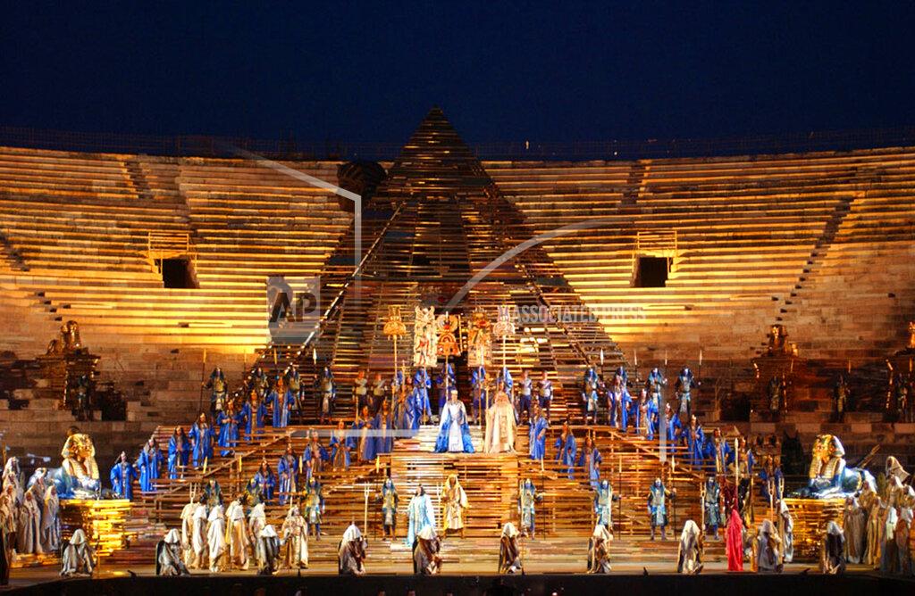 FILE - In this June 21, 2002 file photo, a huge pyramid dominates the stage of the opening performance of Giuseppe Verdi's Aida in the Verona Arena, northern Italy. Riccardo Muti will open the season on June 19 and 22, conducting a concert version of “Aida” to mark the 150th anniversary of the Verdi title whose pageantry has made it a festival mainstay. (AP Photo/Claudio Martinelli)