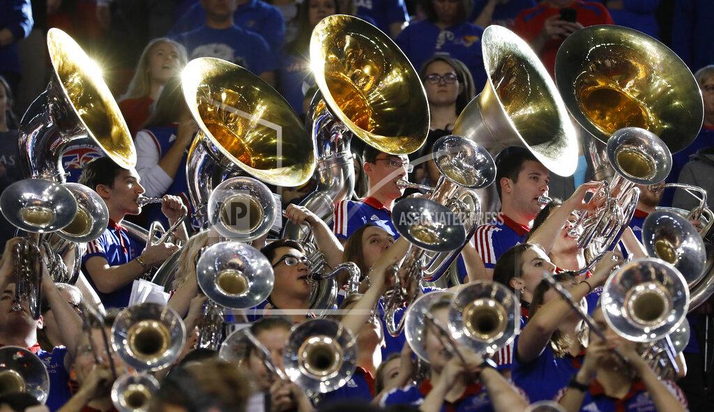 Colin E. Braley The University of Kansas band performs before the Jayhawks' NCAA college basketball game against West Virginia, Saturday, Feb. 16, 2019, in Lawrence, Kan. (AP Photo/Colin E. Braley)