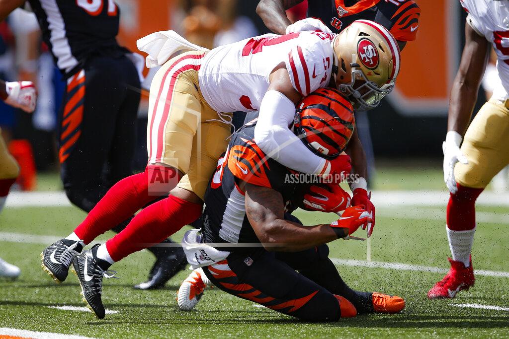 Gary Landers Cincinnati Bengals running back Joe Mixon, below, is tackled by San Francisco 49ers middle linebacker Fred Warner (54) during the first half an NFL football game, Sunday, Sept. 15, 2019, in Cincinnati. (AP Photo/Gary Landers)