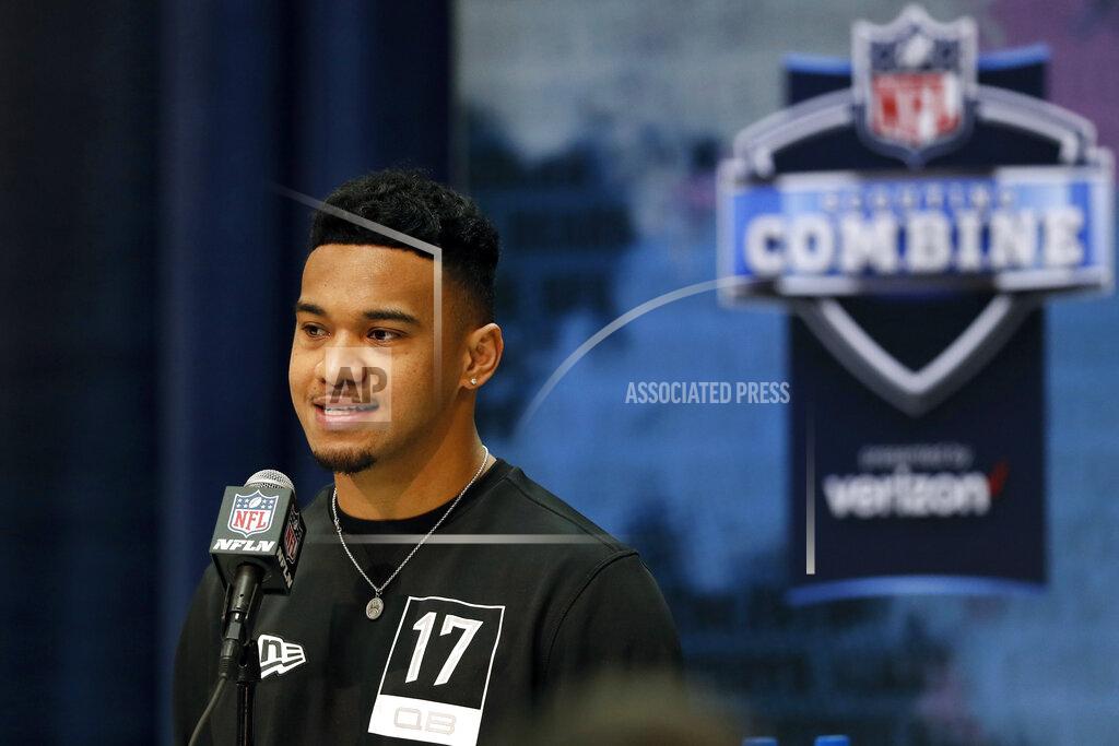 Charlie Neibergall FILE - In this Feb. 25, 2020, file photo, Alabama quarterback Tua Tagovailoa speaks during a press conference at the NFL football scouting combine in Indianapolis. The rookie quarterback has reported to Miami Dolphins training camp and will practice without restrictions as he comes back from a knee injury and begins to compete to overtake veteran Ryan Fitzpatrick for the starting job. (AP Photo/Charlie Neibergall, File)