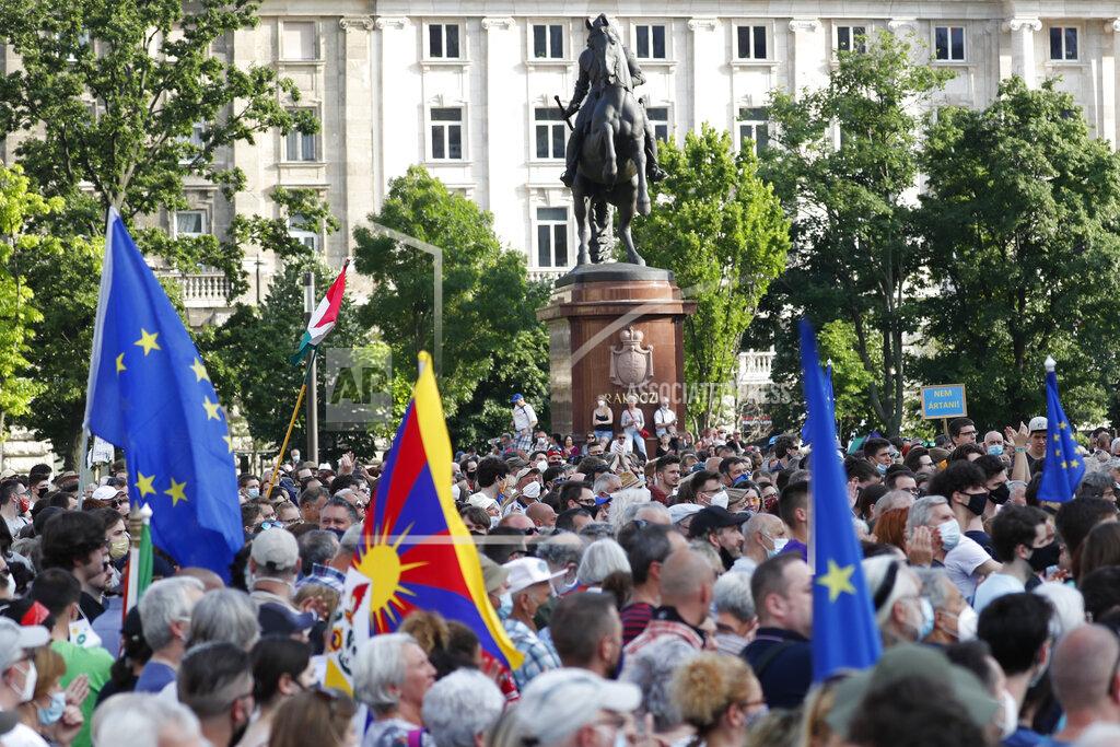Laszlo Balogh Protesters gather in downtown Budapest, Hungary, Saturday, June 5, 2021. Thousands of people gathered opposing the Hungarian government's plan of building a campus for China's Fudan University in Budapest. (AP Photo/Laszlo Balogh)