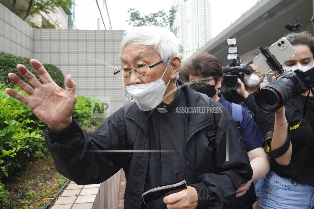 Kin Cheung Catholic Cardinal Joseph Zen leaves after an appearance at a court in Hong Kong as he was charged in relation to their past fundraising for activists, Tuesday, May 24, 2022. (AP Photo/Kin Cheung)