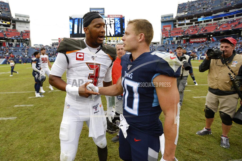 Mark Zaleski Tampa Bay Buccaneers quarterback Jameis Winston (3) shakes hands with Tennessee Titans wide receiver Adam Humphries (10) after an NFL football game Sunday, Oct. 27, 2019, in Nashville, Tenn. The Titans won 27-23. (AP Photo/Mark Zaleski)
