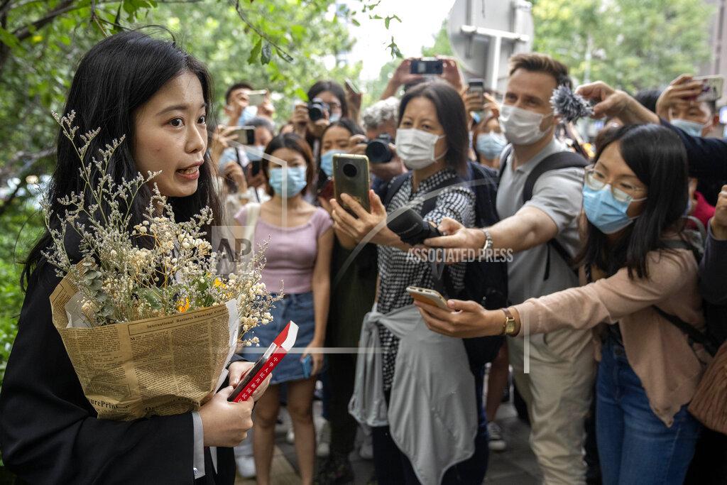 Mark Schiefelbein Zhou Xiaoxuan, a former intern at China's state broadcaster CCTV, speaks outside a courthouse before attending a session in her court case against a television host she accuses of groping and forcibly kissing her in Beijing, Tuesday, Sept. 14, 2021. Zhou became the face of the country's MeToo movement after going public with accusations against a prominent CCTV host in 2018. Since then, even as the movement was shut down by authorities, Zhou has continued to speak out. (AP Photo/Mark Schiefelbein)