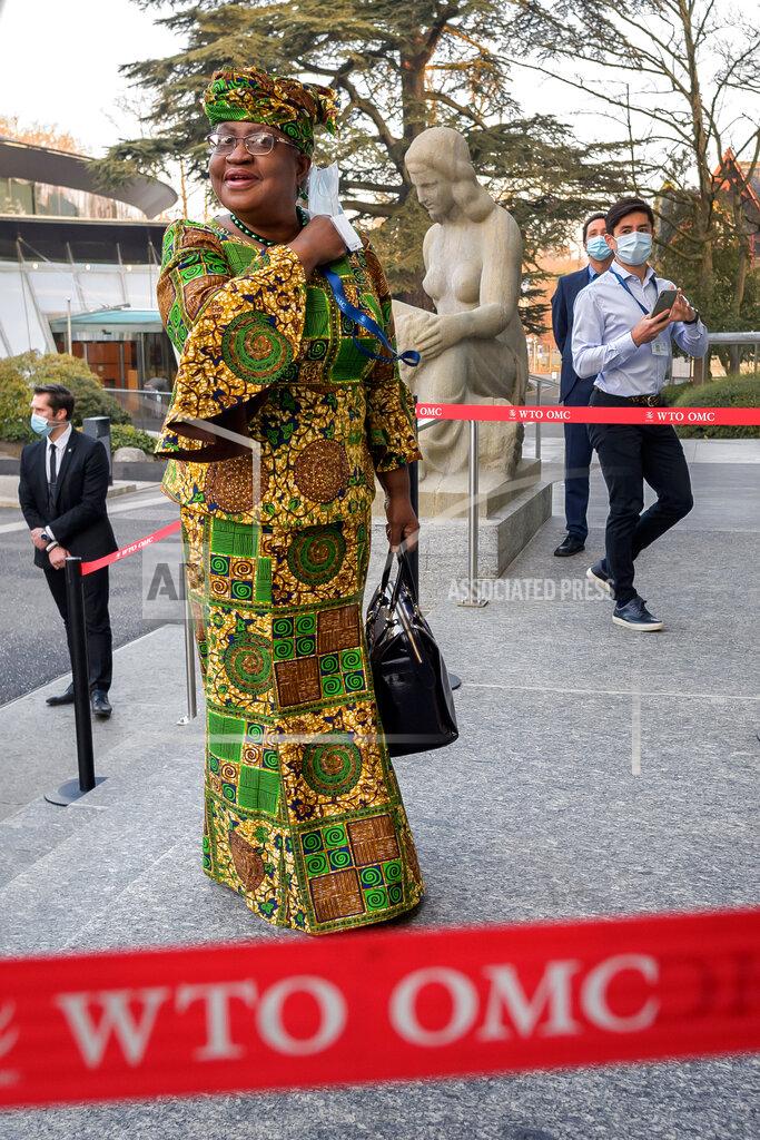 Fabrice Coffrini New Director-General of the World Trade Organisation (WTO) Ngozi Okonjo-Iweala arrives at the WTO headquarters to takes office in Geneva, Switzerland, Monday, March 1, 2021. Nigeria's Ngozi Okonjo-Iweala takes the reins of the WTO amid hope she will infuse the beleaguered body with fresh momentum to address towering challenges and a pandemic-fuelled global economic crisis. (Fabrice Coffrini/Pool/Keystone via AP)