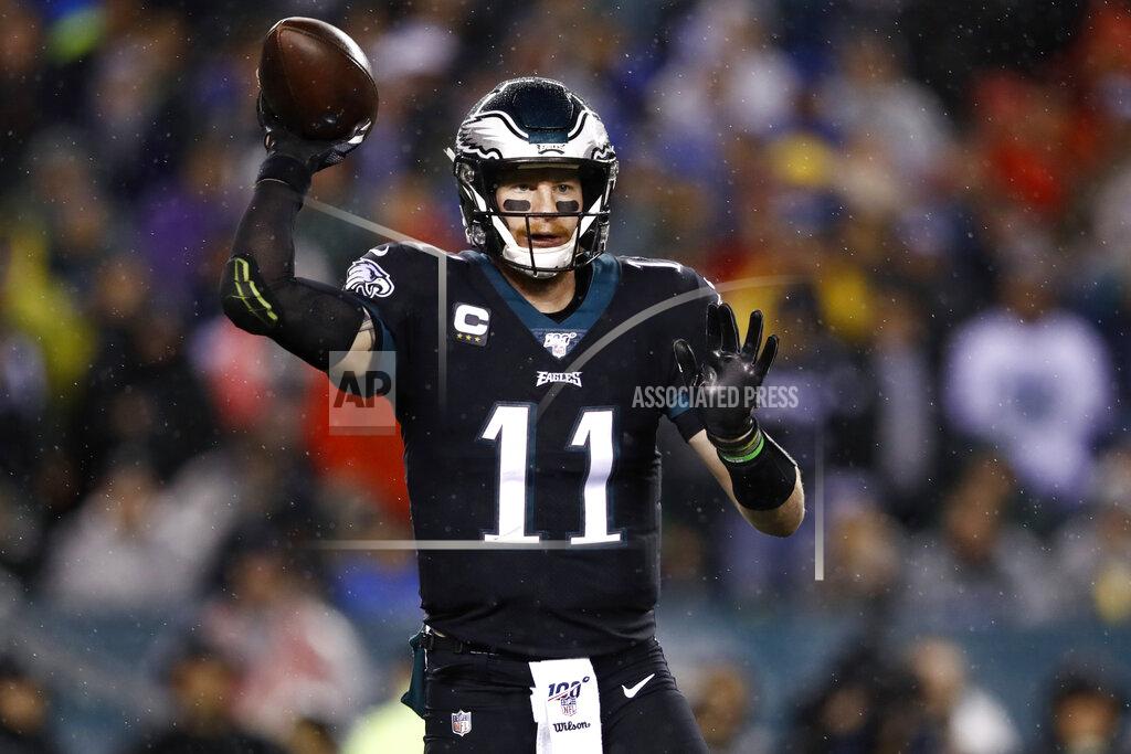Matt Rourke Philadelphia Eagles' Carson Wentz passes during the first half of an NFL football game against the New York Giants, Monday, Dec. 9, 2019, in Philadelphia. (AP Photo/Matt Rourke)