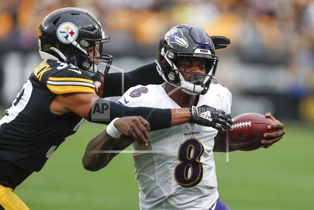 Don Wright Pittsburgh Steelers free safety Minkah Fitzpatrick (39) tackles Baltimore Ravens quarterback Lamar Jackson (8) as he scrambles during overtime of an NFL football game, Sunday, Oct. 6, 2019, in Pittsburgh. The Ravens won 26-23. (AP Photo/Don Wright)