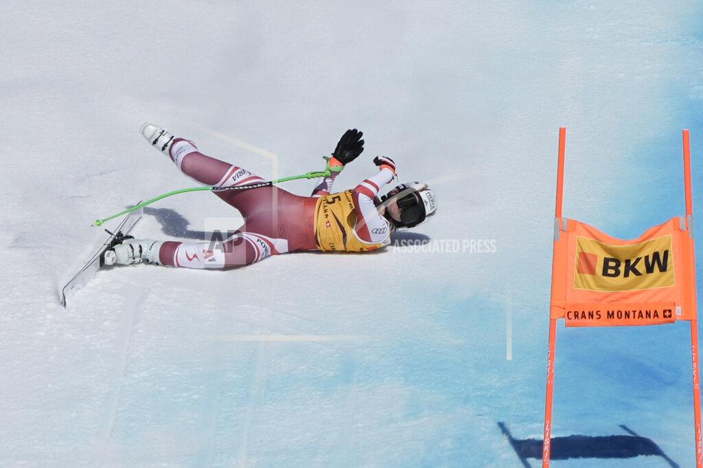 Giovanni Auletta Austria's Cornelia Huetter falls during an alpine ski, women's World Cup downhill race, in Crans Montana, Switzerland, Sunday, Feb. 27, 2022. (AP Photo/Giovanni Auletta)