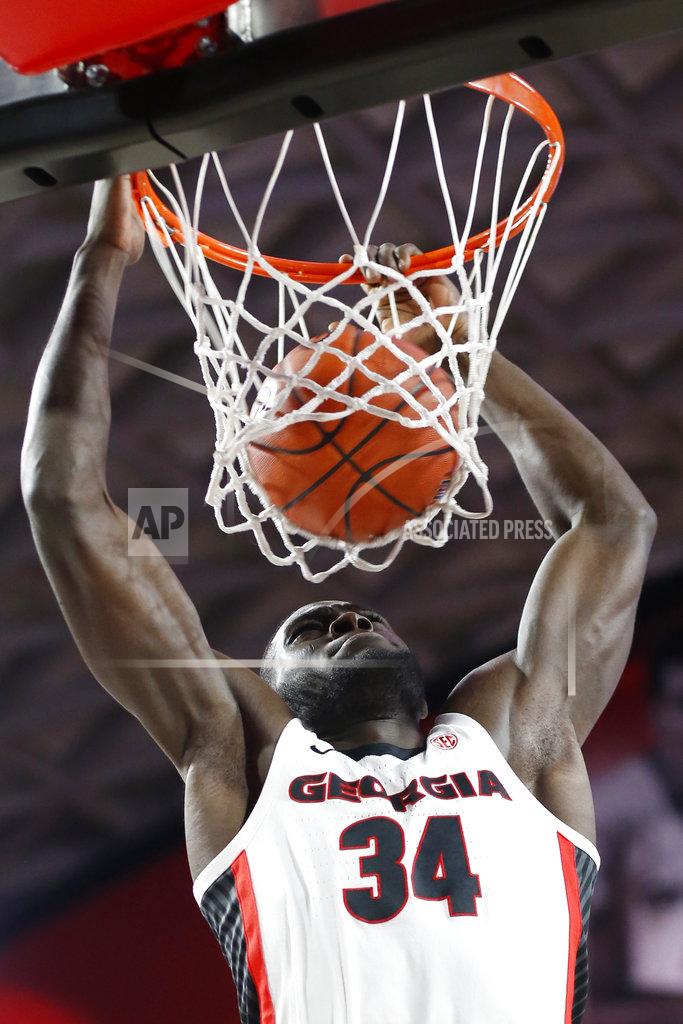 Joshua L. Jones Georgia forward Derek Ogbeide (34) dunks the ball against Vanderbilt during an NCAA college basketball game, Wednesday, Jan. 9, 2019 in Athens, Ga. (Joshua L. Jones/Athens Banner-Herald via AP)