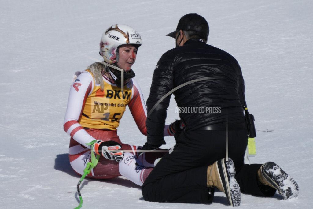 Giovanni Auletta Austria's Cornelia Huetter after her fall during an alpine ski, women's World Cup downhill race, in Crans Montana, Switzerland, Sunday, Feb. 27, 2022. (AP Photo/Giovanni Auletta)