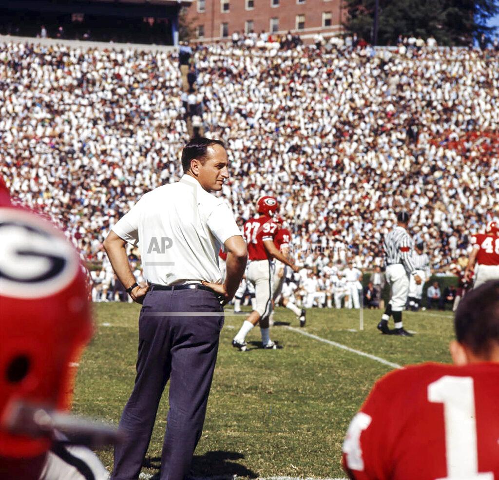 Floyd Jillson Coach Vince Dooley watches the game from the sidelines, 1965. (Floyd Jillson/Atlanta Journal-Constitution via AP)