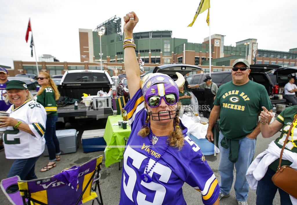 Mike Roemer Jan Weiser tailgates before an NFL football game between the Green Bay Packers and the Minnesota Vikings Sunday, Sept. 15, 2019, in Green Bay, Wis. (AP Photo/Mike Roemer)