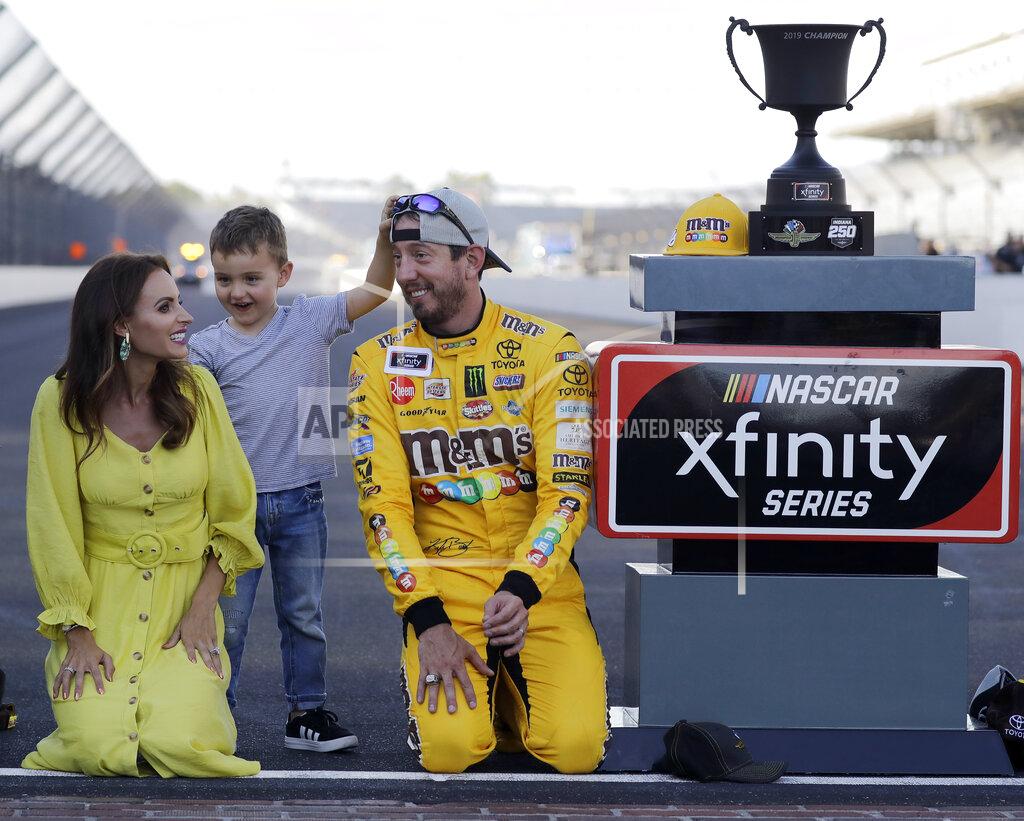 Darron Cummings FILE - In this Sept. 7, 2019, file photo, NASCAR Xfinity Series driver Kyle Busch, right, celebrates with his wife, Samantha, and son, Brexton, after winning a NASCAR Xfinity auto race at Indianapolis Motor Speedway in Indianapolis. The Busch family hobby came full circle at Las Vegas Motor Speedway, where Kurt Busch finally won for the first time in his career Sunday, Sept. 27, 2020. The victory came about 24 hours after his nephew, Brexton, won his first race at a track in North Carolina. The 5-year-old son of reigning Cup champion Kyle is being developed by Tom Busch, who molded his own two sons into NASCAR champions. (AP Photo/Darron Cummings, File)