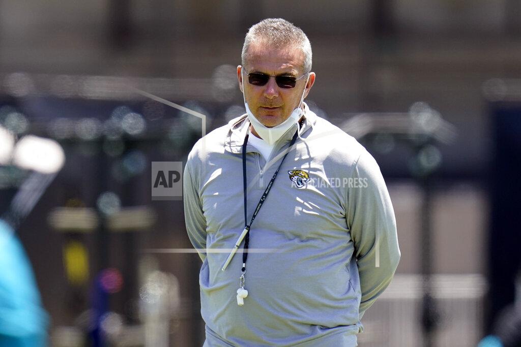 John Raoux Jacksonville Jaguars head coach Urban Meyer watches players run drills during NFL football rookie minicamp, Saturday, May 15, 2021, in Jacksonville, Fla. (AP Photo/John Raoux)