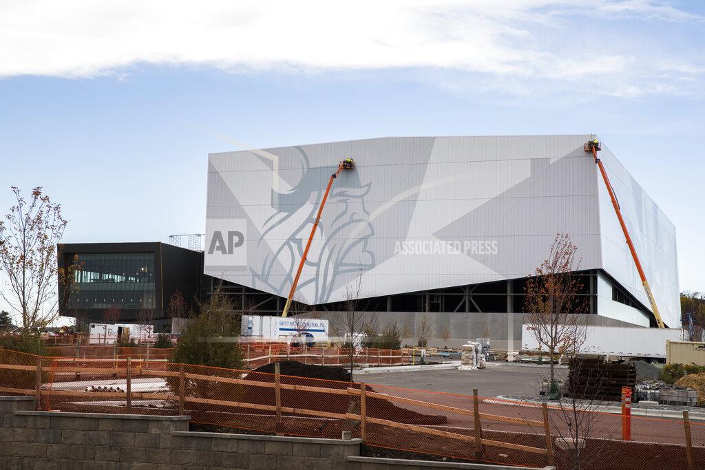 Leila Navidi FILE - In this Oct. 23, 2017, file photo, the Minnesota Vikings' indoor arena, right, and offices are seen under construction in Eagan, Minn. The NFL has set protocols for reopening team facilities and has told the 32 teams to have them in place by May 15. In a memo sent by Commissioner Roger Goodell and obtained Wednesday night, May 6, by The Associated Press, several phases of the protocols were laid out. (Leila Navidi/Star Tribune via AP, File)